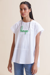 Green leather women's short with distinctive hope-link metal necklace